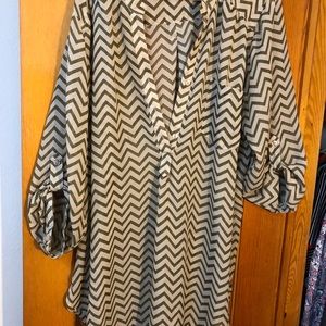 Sheer tunic, cute with jeans and boots.